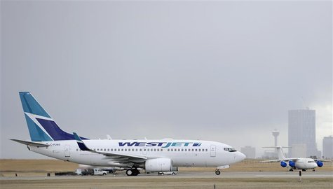 A Westjet Boeing 737-700 takes off at the International Airport in Calgary, Alberta, May 3, 2011. REUTERS/Todd Korol A Westjet Boeing 737-700 takes off at the International Airport in Calgary, Alberta, May 3, 2011. REUTERS/Todd Korol