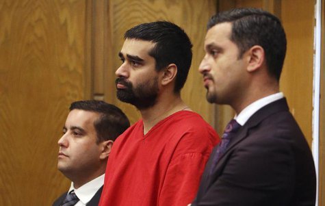 Derek Medina appears in court for his arraignment with attorneys Mauricio Padilla (L) and Saam Zangeneh in Miami, Florida August 29, 2013. R Derek Medina appears in court for his arraignment with attorneys Mauricio Padilla (L) and Saam Zangeneh in Miami, Florida August 29, 2013. R
