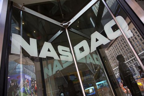 A security officer stands guard outside the Nasdaq MarketSite in New York's Times Square, August 23, 2013. REUTERS/Andrew Kelly A security officer stands guard outside the Nasdaq MarketSite in New York's Times Square, August 23, 2013. REUTERS/Andrew Kelly