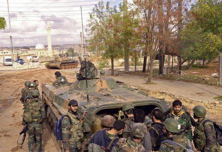 Forces loyal to Syria's President Bashar al-Assad prepare for military operations in areas controlled by the Free Syrian Army fighters, in A Forces loyal to Syria's President Bashar al-Assad prepare for military operations in areas controlled by the Free Syrian Army fighters, in A