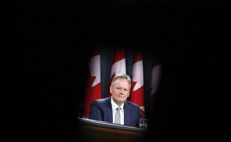 Bank of Canada Governor Stephen Poloz is framed by seats while taking part in a news conference upon the release of the Monetary Policy Repo Bank of Canada Governor Stephen Poloz is framed by seats while taking part in a news conference upon the release of the Monetary Policy Repo