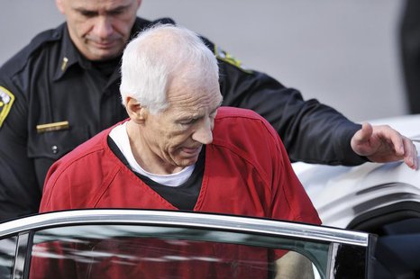 Jerry Sandusky leaves the Centre County Courthouse after his sentencing in his child sex abuse case in Bellefonte, Pennsylvania October 9, 2 Jerry Sandusky leaves the Centre County Courthouse after his sentencing in his child sex abuse case in Bellefonte, Pennsylvania October 9, 2
