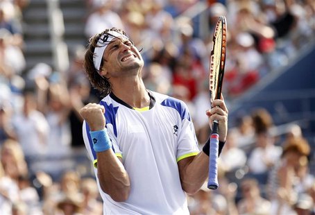 David Ferrer of Spain celebrates his victory over compatriot Roberto Bautista Agut at the U.S. Open tennis championships in New York August David Ferrer of Spain celebrates his victory over compatriot Roberto Bautista Agut at the U.S. Open tennis championships in New York August
