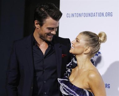 Actor Josh Duhamel (L) and his wife singer Fergie arrives at The Clinton Foundation Gala in celebration of the organization's "Decade of Dif Actor Josh Duhamel (L) and his wife singer Fergie arrives at The Clinton Foundation Gala in celebration of the organization's "Decade of Dif