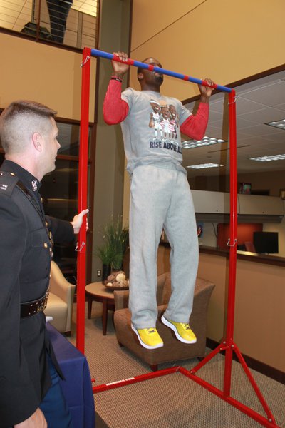 James Jones displays his pull-up power for The Marines
