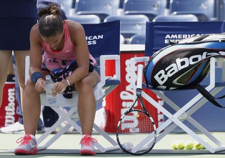 Sara Errani of Italy sits during a break in play against compatriot Flavia Pennetta at the U.S. Open tennis championships in New York August Sara Errani of Italy sits during a break in play against compatriot Flavia Pennetta at the U.S. Open tennis championships in New York August