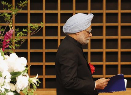 Indian Prime Minister Manmohan Singh walks towards the podium to deliver his speech at a hotel in Tokyo May 28, 2013. REUTERS/Yuya Shino Indian Prime Minister Manmohan Singh walks towards the podium to deliver his speech at a hotel in Tokyo May 28, 2013. REUTERS/Yuya Shino