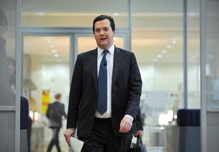 Britain's Chancellor of the Exchequer George Osborne arrives to speak at a news conference at the conclusion of the International Monetary F Britain's Chancellor of the Exchequer George Osborne arrives to speak at a news conference at the conclusion of the International Monetary F