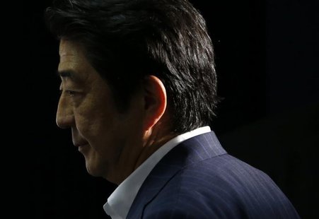 Japan's Prime Minister Shinzo Abe, and the leader of the ruling Liberal Democratic Party (LDP), makes an appearance before media at the LDP Japan's Prime Minister Shinzo Abe, and the leader of the ruling Liberal Democratic Party (LDP), makes an appearance before media at the LDP