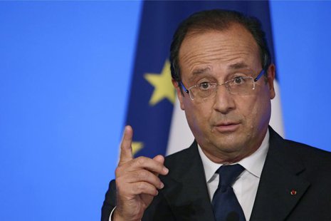 France's President Francois Hollande reacts as he delivers a speech during the annual Conference of Ambassadors at the Elysee Palace in Pari France's President Francois Hollande reacts as he delivers a speech during the annual Conference of Ambassadors at the Elysee Palace in Pari