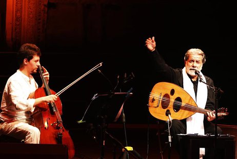 Lebanese composer and singer Marcel Khalife performs with cello player Sari Khalife during the Baalbek festival, which was held in La Magnan Lebanese composer and singer Marcel Khalife performs with cello player Sari Khalife during the Baalbek festival, which was held in La Magnan
