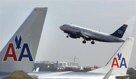 A U.S. Airways jet departs Washington's Reagan National Airport next to American Airlines jets outside Washington, February 25, 2013. REUTER A U.S. Airways jet departs Washington's Reagan National Airport next to American Airlines jets outside Washington, February 25, 2013. REUTER