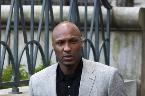 Basketball player Lamar Odom departs the New York state Supreme Court after a child custody hearing with his ex-girlfriend, Liza Morales, in Basketball player Lamar Odom departs the New York state Supreme Court after a child custody hearing with his ex-girlfriend, Liza Morales, in