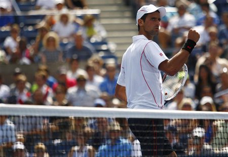 Novak Djokovic of Serbia celebrates a point against Benjamin Becker of Germany at the U.S. Open tennis championships in New York August 30, Novak Djokovic of Serbia celebrates a point against Benjamin Becker of Germany at the U.S. Open tennis championships in New York August 30,