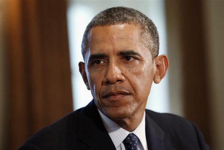 U.S. President Barack Obama looks up during a meeting with Baltic leaders in the Cabinet Room of the White House in Washington August 30, 20 U.S. President Barack Obama looks up during a meeting with Baltic leaders in the Cabinet Room of the White House in Washington August 30, 20