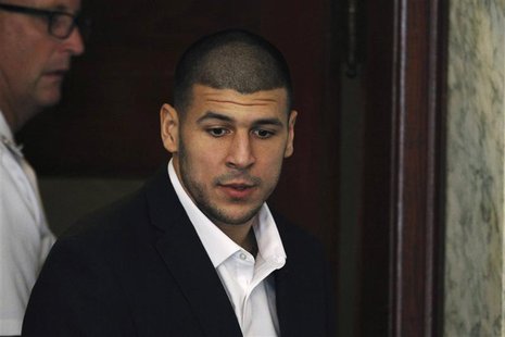 Former NFL New England Patriots tight end Aaron Hernandez, accused of killing 27-year-old semi-pro football player Odin Lloyd, is brought to Former NFL New England Patriots tight end Aaron Hernandez, accused of killing 27-year-old semi-pro football player Odin Lloyd, is brought to