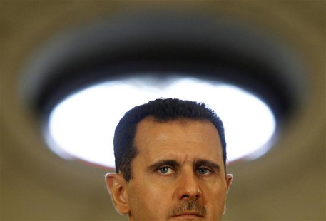 Syria's President Bashar al-Assad attends a news conference with Romania's President Traian Basescu (not pictured) at Cotroceni presidential Syria's President Bashar al-Assad attends a news conference with Romania's President Traian Basescu (not pictured) at Cotroceni presidential