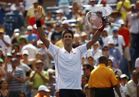 Novak Djokovic of Serbia waves after defeating Benjamin Becker of Germany at the U.S. Open tennis championships in New York August 30, 2013. Novak Djokovic of Serbia waves after defeating Benjamin Becker of Germany at the U.S. Open tennis championships in New York August 30, 2013.