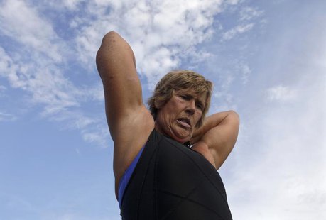 U.S. long-distance swimmer Diana Nyad adjusts her swimwear before attempting to swim to Florida from Havana September 23, 2011. REUTERS/Enri U.S. long-distance swimmer Diana Nyad adjusts her swimwear before attempting to swim to Florida from Havana September 23, 2011. REUTERS/Enri