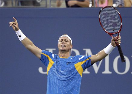 Lleyton Hewitt of Australia celebrates defeating Juan Martin Del Potro of Argentina in the 5th set at the U.S. Open tennis championships in Lleyton Hewitt of Australia celebrates defeating Juan Martin Del Potro of Argentina in the 5th set at the U.S. Open tennis championships in