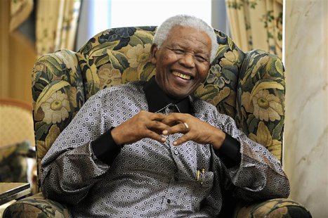 Former president of South Africa Nelson Mandela chats with Britain's Prime Minister Gordon Brown (unseen) during a meeting at his hotel in c Former president of South Africa Nelson Mandela chats with Britain's Prime Minister Gordon Brown (unseen) during a meeting at his hotel in c