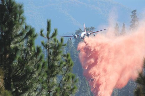 A tanker drops retardant on the Rim Fire in this undated United States Forest Service handout photo near Yosemite National Park, California, A tanker drops retardant on the Rim Fire in this undated United States Forest Service handout photo near Yosemite National Park, California,