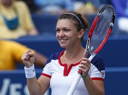 Simona Halep of Romania reacts after defeating Maria Kirilenko of Russia at the U.S. Open tennis championships in New York August 31, 2013. Simona Halep of Romania reacts after defeating Maria Kirilenko of Russia at the U.S. Open tennis championships in New York August 31, 2013.