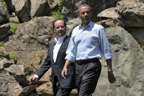 France's President Francois Hollande (L) and U.S. President Barack Obama walk to the family photo session at the G8 summit at Camp David, Ma France's President Francois Hollande (L) and U.S. President Barack Obama walk to the family photo session at the G8 summit at Camp David, Ma