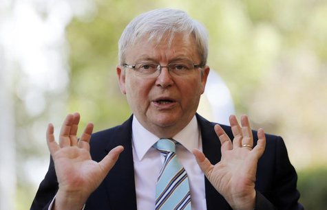 Australian Prime Minister Kevin Rudd gestures as he talks to parents at the Mascot Early Childhood Centre as part of his election campaign i Australian Prime Minister Kevin Rudd gestures as he talks to parents at the Mascot Early Childhood Centre as part of his election campaign i