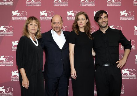 Director Alexandros Avranas (R) poses with actors Eleni Roussinou (2nd R), Reni Pittaki (L) and Themis Panou during a photocall for their mo Director Alexandros Avranas (R) poses with actors Eleni Roussinou (2nd R), Reni Pittaki (L) and Themis Panou during a photocall for their mo