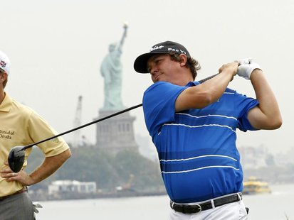 Jason Dufner of the U.S. tees off on the 15th hole during the first round of the Barclays PGA golf tournament in Jersey City, New Jersey Aug Jason Dufner of the U.S. tees off on the 15th hole during the first round of the Barclays PGA golf tournament in Jersey City, New Jersey Aug