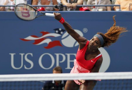 Serena Williams of the U.S. serves to compatriot Sloane Stephens at the U.S. Open tennis championships in New York September 1, 2013. REUTER Serena Williams of the U.S. serves to compatriot Sloane Stephens at the U.S. Open tennis championships in New York September 1, 2013. REUTER
