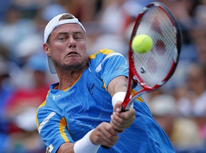 Lleyton Hewitt of Australia hits a return return to Evgeny Donskoy of Russia at the U.S. Open tennis championships in New York September 1, Lleyton Hewitt of Australia hits a return return to Evgeny Donskoy of Russia at the U.S. Open tennis championships in New York September 1,
