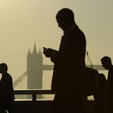 Workers cross London Bridge, with Tower Bridge seen behind, during the morning rush hour in London September 30, 2011. REUTERS/Paul Hackett Workers cross London Bridge, with Tower Bridge seen behind, during the morning rush hour in London September 30, 2011. REUTERS/Paul Hackett