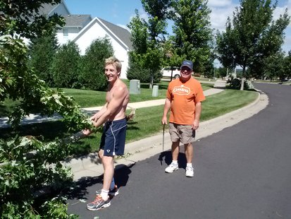 Dan Todd and Jim Daniels remove tree limbs from Saturday's storm. (KELO AM Photo) Dan Todd and Jim Daniels remove tree limbs from Saturday's storm. (KELO AM Photo)