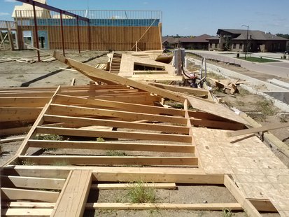 The frame walls of a business under construction near the corner of 62nd and Western were blown over by Saturday's high winds. (KELO AM Photo) The frame walls of a business under construction near the corner of 62nd and Western were blown over by Saturday's high winds. (KELO AM Photo)