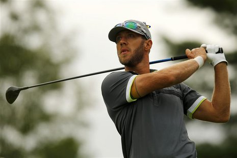 Graham DeLaet of Canada hits off the tenth tee during the first round of the Deutsche Bank Championship golf tournament in Norton, Massachus Graham DeLaet of Canada hits off the tenth tee during the first round of the Deutsche Bank Championship golf tournament in Norton, Massachus