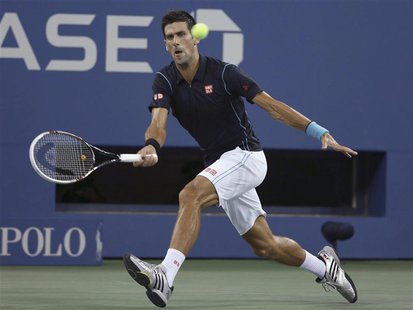 Novak Djokovic of Serbia returns a forehand to Joao Sousa of Portugal at the U.S. Open tennis championships in New York, September 1, 2013. Novak Djokovic of Serbia returns a forehand to Joao Sousa of Portugal at the U.S. Open tennis championships in New York, September 1, 2013.