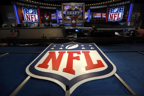 The NFL logo and set are seen at New York's Radio City Music Hall before the start of the 2013 NFL Draft April 25, 2013. REUTERS/Shannon Sta The NFL logo and set are seen at New York's Radio City Music Hall before the start of the 2013 NFL Draft April 25, 2013. REUTERS/Shannon Sta