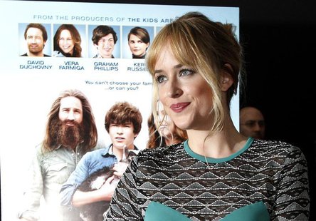 Cast member Dakota Johnson poses at the premiere of "Goats" at the Landmark theatre in Los Angeles, California August 8, 2012. REUTERS/Mario Cast member Dakota Johnson poses at the premiere of "Goats" at the Landmark theatre in Los Angeles, California August 8, 2012. REUTERS/Mario