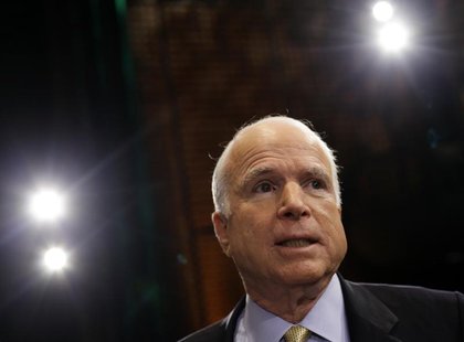 U.S. Senator John McCain (R-AZ) speaks to reporters after attending a "Conversation On Immigration" during a town hall event in Mesa, Arizon U.S. Senator John McCain (R-AZ) speaks to reporters after attending a "Conversation On Immigration" during a town hall event in Mesa, Arizon
