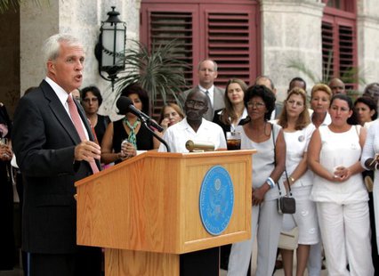 U.S. top diplomat in Havana Michael Parmly (L) addresses foreign diplomats and Cuban dissidents on International Human Rights Day at his res U.S. top diplomat in Havana Michael Parmly (L) addresses foreign diplomats and Cuban dissidents on International Human Rights Day at his res