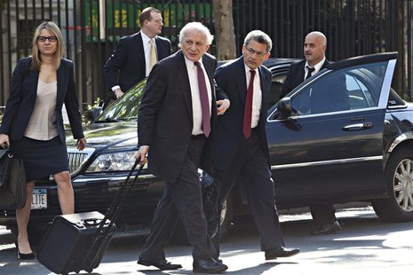 Rajat Gupta (front R), a former Goldman Sachs Group Inc and Procter & Gamble board member, arrives at Manhattan Federal Court in New York, i Rajat Gupta (front R), a former Goldman Sachs Group Inc and Procter & Gamble board member, arrives at Manhattan Federal Court in New York, i