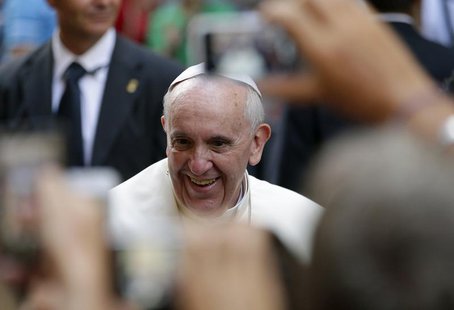 Pope Francis smiles as he arrives for a private visit at the Saint Agostino church in Rome August 28, 2013. REUTERS/Max Rossi Pope Francis smiles as he arrives for a private visit at the Saint Agostino church in Rome August 28, 2013. REUTERS/Max Rossi