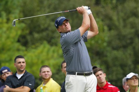 Steve Stricker of the United States hits his tee shot on the third hole during the final round of the Deutsche Bank Championship golf tourna Steve Stricker of the United States hits his tee shot on the third hole during the final round of the Deutsche Bank Championship golf tourna