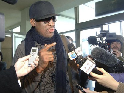Former NBA star Dennis Rodman speaks to media just before he leaves Pyongyang March 1, 2013 in this picture released by North Korea's KCNA n Former NBA star Dennis Rodman speaks to media just before he leaves Pyongyang March 1, 2013 in this picture released by North Korea's KCNA n