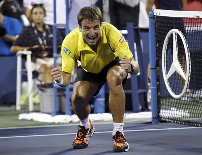Tommy Robredo of Spain celebrates after defeating Roger Federer of Switzerland at the U.S. Open tennis championships in New York September 2 Tommy Robredo of Spain celebrates after defeating Roger Federer of Switzerland at the U.S. Open tennis championships in New York September 2
