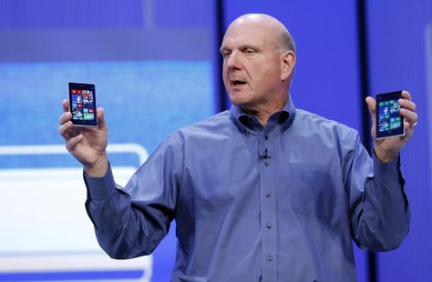Microsoft CEO Steve Ballmer displays Windows phones during his keynote address at the Microsoft "Build" conference in San Francisco, Califor Microsoft CEO Steve Ballmer displays Windows phones during his keynote address at the Microsoft "Build" conference in San Francisco, Califor