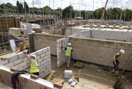 Construction workers build a new residential property development in north London, August 6, 2013. REUTERS/Neil Hall Construction workers build a new residential property development in north London, August 6, 2013. REUTERS/Neil Hall