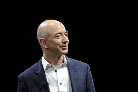 Amazon CEO Jeff Bezos demonstrates the Kindle Paperwhite during Amazon's Kindle Fire event in Santa Monica, California September 6, 2012. RE Amazon CEO Jeff Bezos demonstrates the Kindle Paperwhite during Amazon's Kindle Fire event in Santa Monica, California September 6, 2012. RE